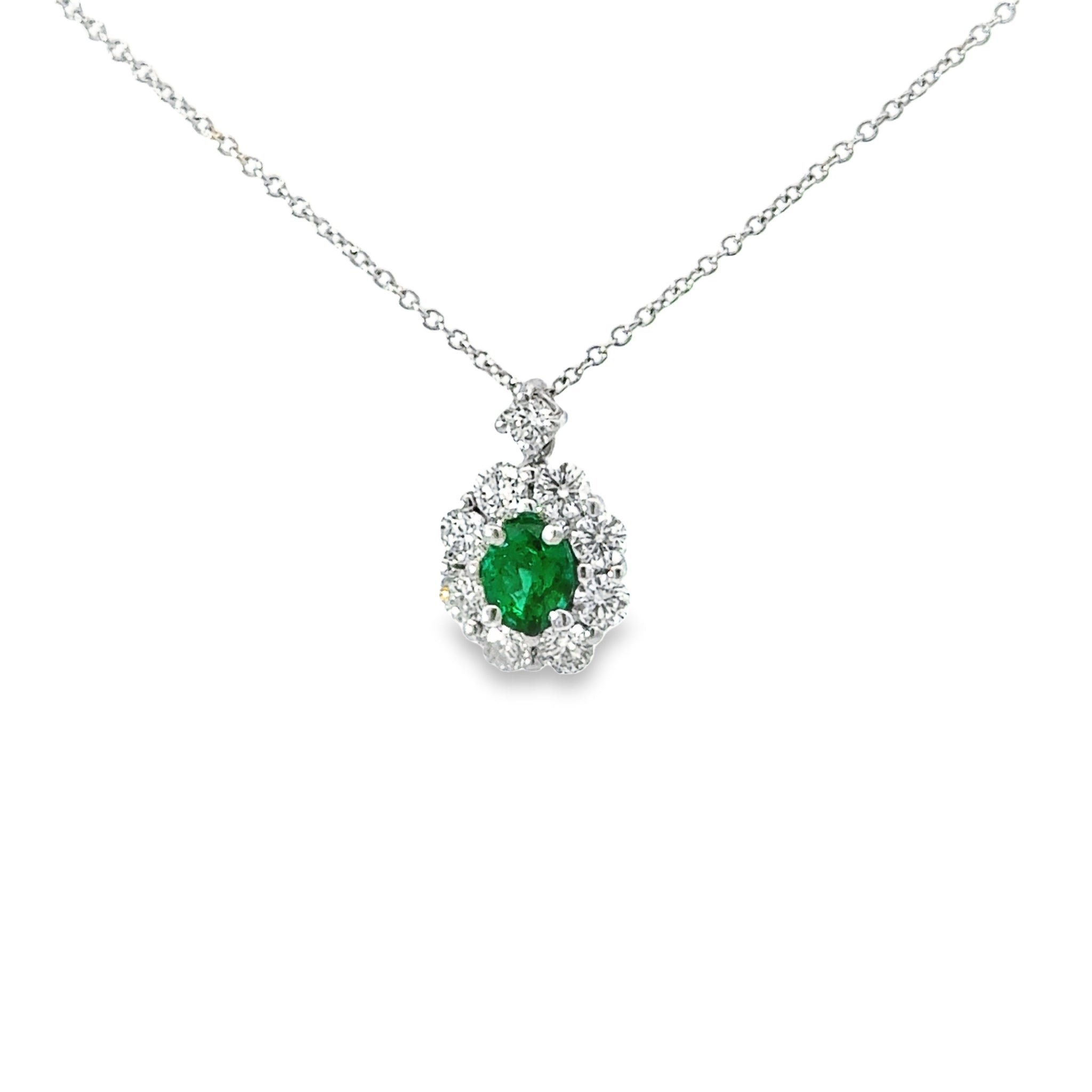 18k White Gold Small Oval Emerald And Diamond Halo Pendant
